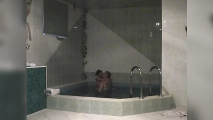 In the pool, a guy fucked a chick in a delicious ass