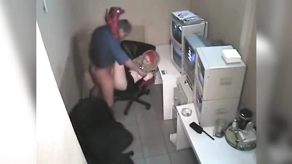 A security guard fucks a girl in boots in the observation room