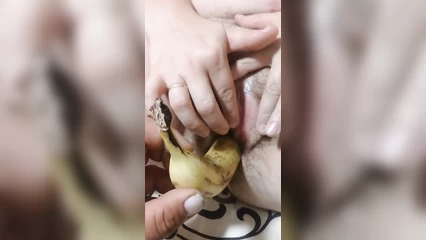 Wife with banana and cucumber