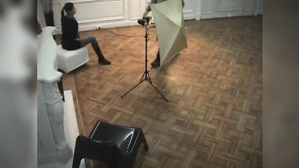 Ira takes off her clothes in front of an experienced photographer
