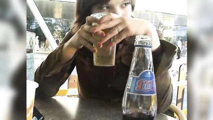 Drunk girlfriend doesn't notice that her friend is peeping up her skirt