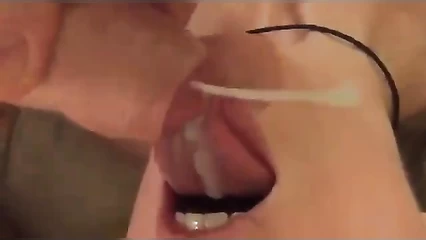 Cock cums in mouth and on face