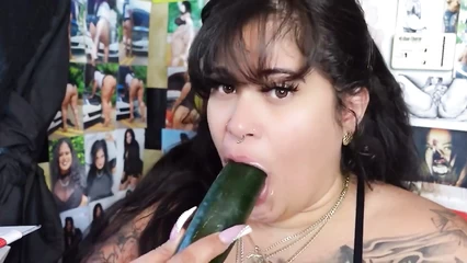 Eats a thick cucumber with sour cream