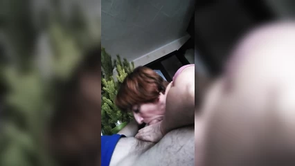 Mom sucks dad under the Christmas tree