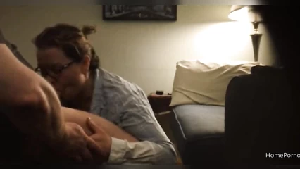 Mature slut with glasses giving a blowjob