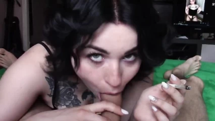 The whore smokes and sucks