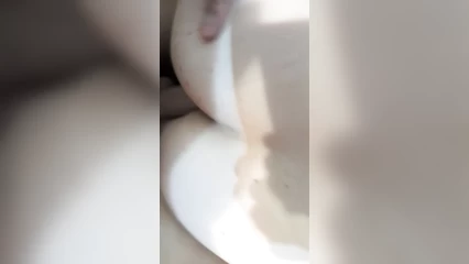 With his wife in the ass