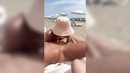 Public blowjob on the beach
