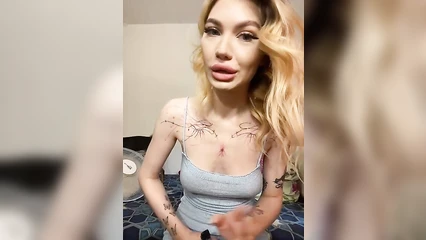 Tattooed blonde is ready for a lot