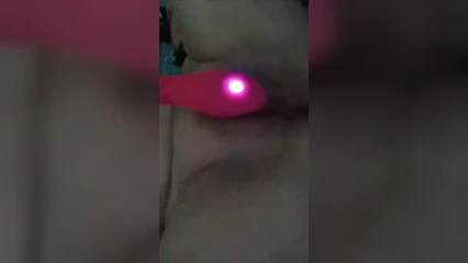 With the vibrator on the pussy