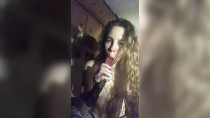 Anyutka sucks a long dildo