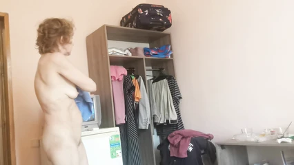 Naked woman comes out of the shower