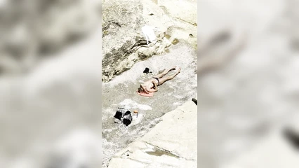 Sunbathing with bare chest