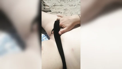 Zrelka sunbathes on the beach