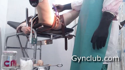 Mature woman undergoing gynecologist examination