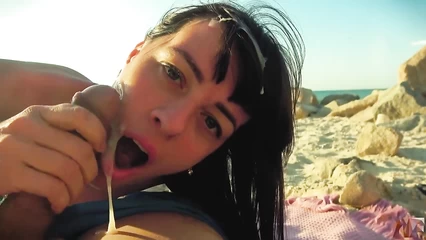 Cute brunette fell asleep on the beach