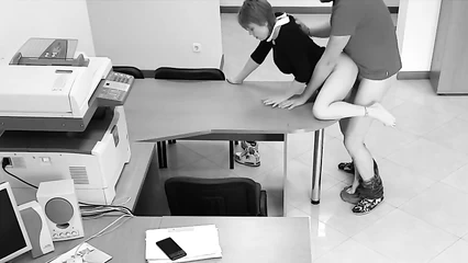 Secretary giving on desk in office
