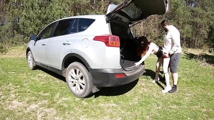 Fat man fucks redhead near car