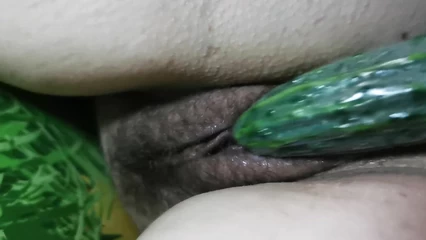 Cucumber in pussy