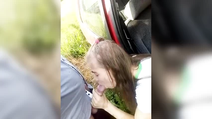 Blowjob from a car in nature