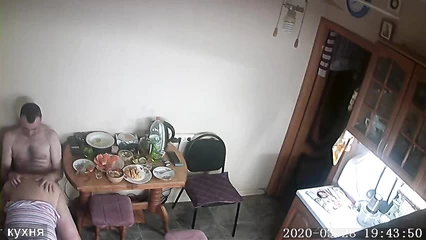 While a drunk friend is sleeping, he cheats in the kitchen