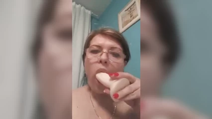 Aunt Tom sucks a rubber penis