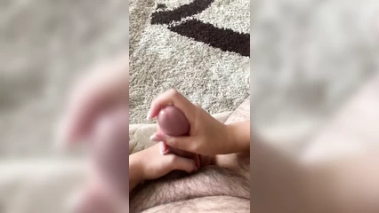 Jerking off dick and massaging balls