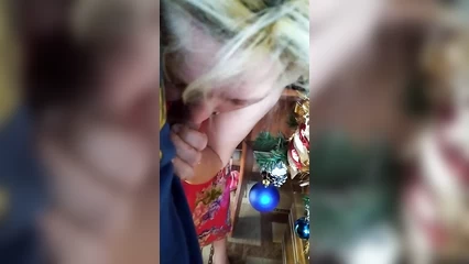 Let's go and suck near the Christmas tree