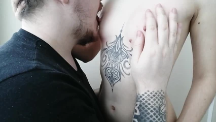 Stirred nipples on small tits with kisses