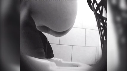 Pissing in the toilet from a stranger