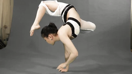 Asian girl shows how skillfully she controls her flexible body